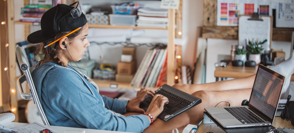 A girl working on a laptop